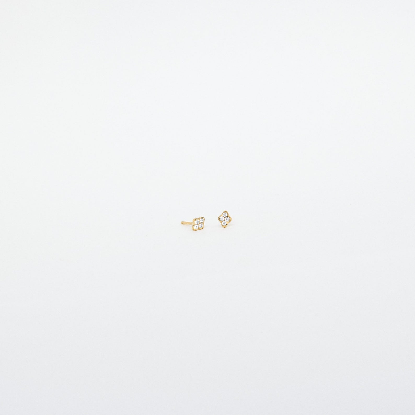 Avery Pavé Diamond Stud Earrings, featuring sparkling CZ diamonds on sterling silver or 18K gold, showcasing timeless elegance and sophistication